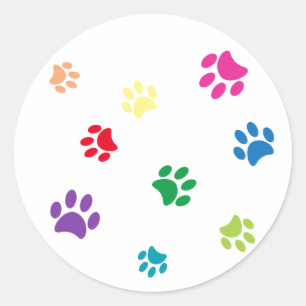 Sticker Rond Empreintes de pattes peintes en arc-en-ciel