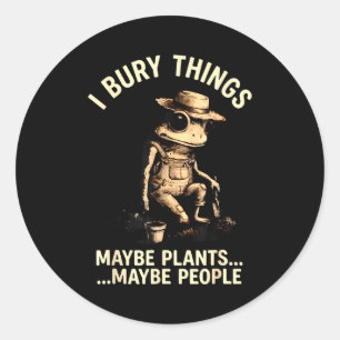 Sticker Rond Enterrer des choses peut-être des plantes peut-êtr