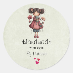 Sticker Rond Fait main avec amour Fille avec une poupée grenoui