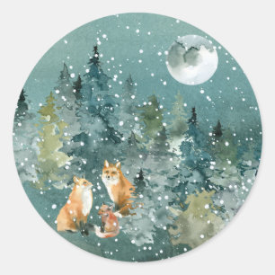 Sticker Rond Famille de renards dans une forêt enneigée sous la
