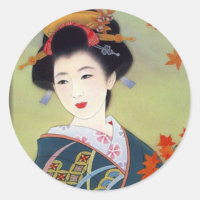 Femme japonaise dans le kimono bleu