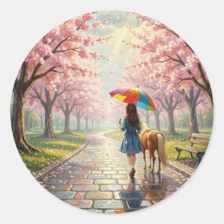 Sticker Rond Fille avec parapluie et poney dans un parc pluvieu