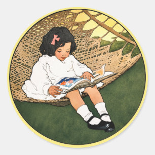 Sticker Rond Fillette vintage lisant dans un hamac