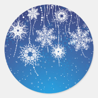 Sticker Rond Flacons de neige étincelants sur le bleu