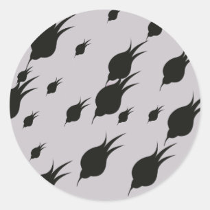 Sticker Rond fleur noire dans des flocons de neige