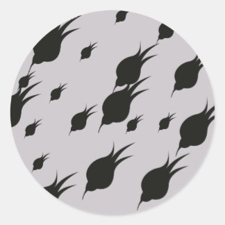 Sticker Rond fleur noire dans des flocons de neige