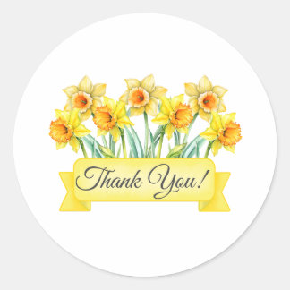 Sticker Rond Fleurs de jonquille avec bannière Merci floral