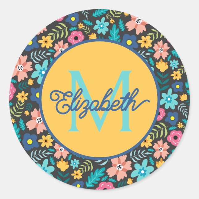 Sticker Rond Fleurs roses et bleues sur monogramme noir (Devant)