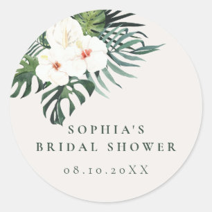 Sticker Rond Fleurs tropicales blanches sur fond de verdure 