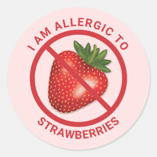 Sticker Rond Fruit de fraise rouge sur fond rose pour la sensib