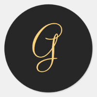 G initial de couleur or sur le monogramme noir