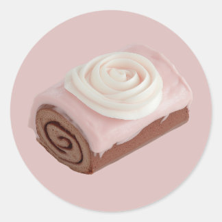 Sticker Rond Gâteau à rouleaux de chocolat avec glaçage rose
