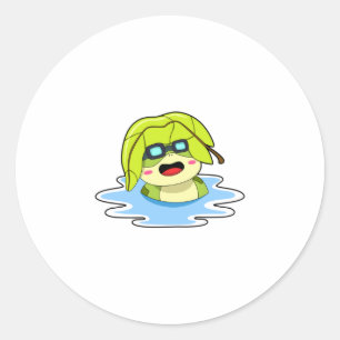 Sticker Rond Grenouille avec feuille à la natation