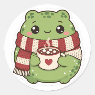 Sticker Rond Grenouille de Noël mignonne avec chocolat chaud et