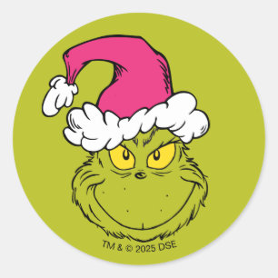 Sticker Rond Grinch avec un chapeau de Père Noël rose