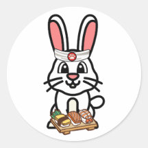 Gros lapin blanc est un chef sushi