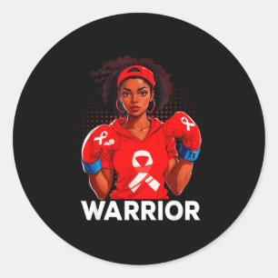 Sticker Rond Guerrière cardiaque femme afro-américaine boxant l