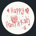 Sticker Rond Happy Hannukah<br><div class="desc">Ce design Happy Hannukah fantaisiste présente une menorah à la place du "U" dans le mot, Hannukah. Cette orthographe est devenue l'orthographe la plus acceptable en anglais, donc même si vous l'épelez généralement Hanuka ou Chanukah, vous ne pouvez pas vous tromper avec celle-ci. La couleur rouge la rend enjouée et...</div>
