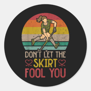 Sticker Rond Hockey sur gazon, ne vous laissez pas tromper par