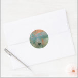 Sticker Rond Impression, lever de soleil par Claude Monet<br><div class="desc">Cette célèbre peinture présente le soleil dans la brume et quelques mâts de bateaux qui s'accrochent au premier plan. Le paysage n'est rien d'autre qu'une impression, et une impression instantanée. Claude Monet Claude Monet était un fondateur de la peinture impressionniste française. Le terme impressionnisme est dérivé du titre de sa...</div>
