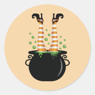 Sticker Rond Jambes de sorcière sortant d'un chaudron Halloween