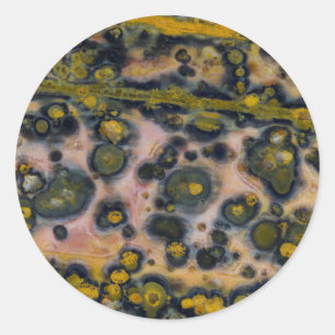 Sticker Rond Jasper d'océan à taches jaunes