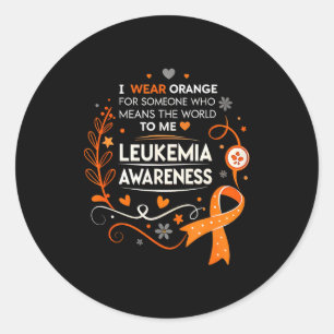Sticker Rond Je porte orange pour quelqu'un qui compte énorméme