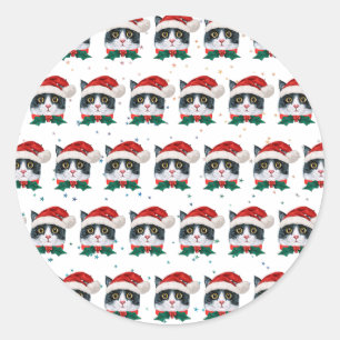 Sticker Rond Joli chat noir et blanc avec chapeau de Père Noël 