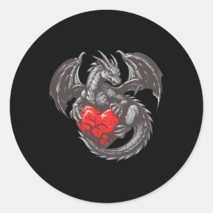 Sticker Rond Joli dragon avec une grande tenue de cœur rouge