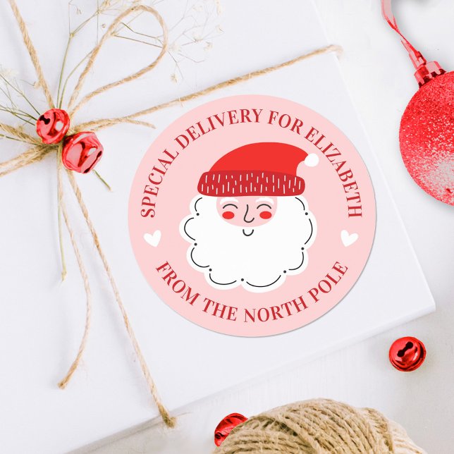 Sticker Rond Joli Noël Père Noël Livraison spéciale Pôle Nord (A cute pink and red Santa Claus special delivery sticker. Great for decorating Christmas gifts.)
