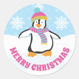 Sticker Rond Joli pingouin de Noël avec chapeau rose et bleu