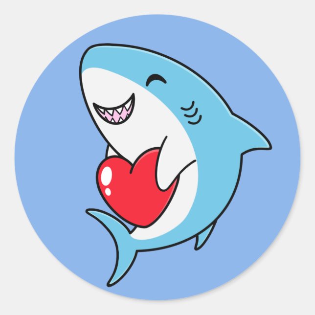 Sticker Rond Joli requin bleu tenant un coeur rouge (Devant)