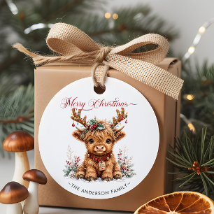 Sticker Rond Joli vache Highland de Noël avec des bois festifs