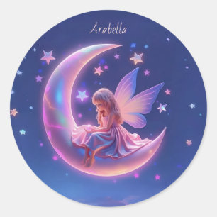 Sticker Rond Jolie fée blonde lumineuse assise sur la lune