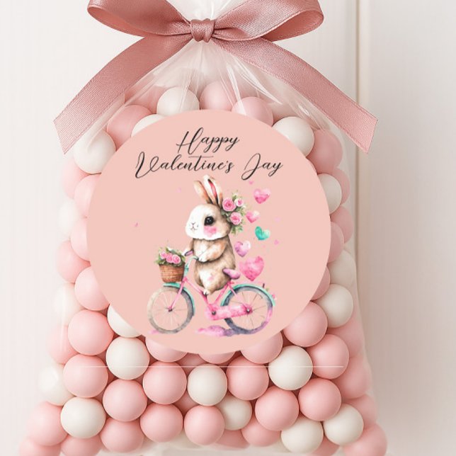 Sticker Rond Jolis cœurs de lapin rose Joyeuse Saint-Valentin (Cute bunny on a bicycle "Happy Valentine's Day" sticker)