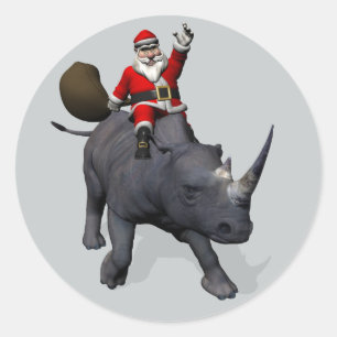 Sticker Rond Jolly Santa Claus À cheval Sur Un Rhino