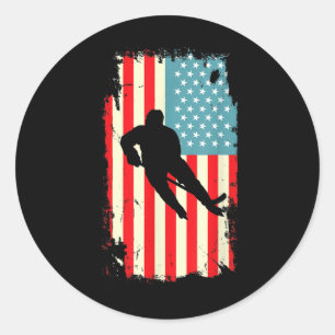 Sticker Rond Joueur de hockey au drapeau américain Hockey sur g