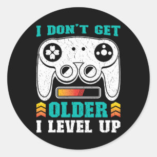 Sticker Rond Joueur Rétro N'Age Pas Je Passe au Niveau Supérieu