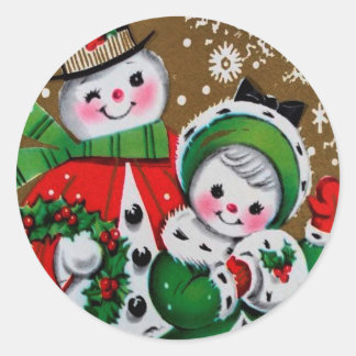 Sticker Rond Joyeux bonhomme de neige de Noël et sa petite amie
