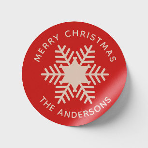 Sticker Rond Joyeux Noël. Fêtes aux flocons rouges roses