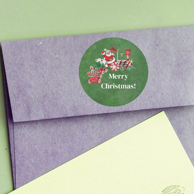 Sticker Rond Joyeux Train de Noël avec Père Noël Sucres de cann (Santa Claus on red white Merry Christmas train with candy and letters to Santa on Green sticker.)