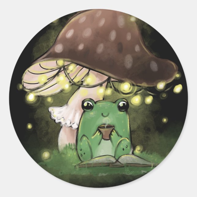 Sticker Rond Juste une petite grenouille lisant un livre (Devant)