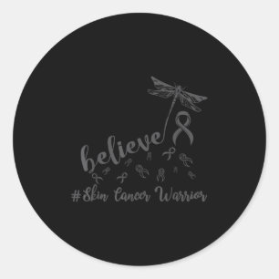 Sticker Rond La libellule guerrière du cancer de la peau croit 
