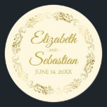 Sticker Rond Lacy Gold Filigree Elegant Cream Wedding Favor<br><div class="desc">Ces beaux autocollants sont dotés d'un texte doré sur un arrière - plan crème ou ivoire avec une bordure florale en faux feuille d'or. Le texte est entièrement personnalisable et contient les noms du couple mariage et la date du mariage. Super comme étiquettes de faveur!</div>