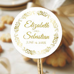 Sticker Rond Lacy Gold Filigree Élégant mariage Faveur<br><div class="desc">Ces beaux autocollants sont conçus pour coordonner avec notre Gold Foil Elegant Wedding Suite. Ils présentent du texte en or sur un arrière - plan blanc avec une bordure florale en faux feuille d'or. Le texte est entièrement personnalisable et contient les noms du couple mariage et la date du mariage....</div>