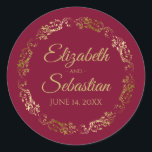 Sticker Rond Lacy Gold Filigree Elegant Maroon Mariage Bourgogn<br><div class="desc">Ces élégants autocollants de mariage présentent du texte de script en or fantaisie sur un marron ou un rouge bordeaux avec une bordure florale en faux feuille d'or en dentelle. Le texte est entièrement personnalisable et contient les noms du couple mariage et la date du mariage. Super comme des étiquettes...</div>