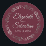 Sticker Rond Lacy Silver Filigree Élégant Mariage Bourgogne<br><div class="desc">Ces élégants autocollants de mariage présentent un texte de script gris pâle sur un arrière - plan bordeaux, marron ou rouge vif avec une bordure florale en faux feuille argent en dentelle. Le texte est entièrement personnalisable et contient les noms du couple mariage et la date du mariage. Super comme...</div>