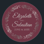 Sticker Rond Lacy Silver Filigree Élégant Mariage Bourgogne<br><div class="desc">Ces élégants autocollants de mariage présentent un texte de script gris pâle sur un arrière - plan bordeaux, marron ou rouge vif avec une bordure florale en faux feuille argent en dentelle. Le texte est entièrement personnalisable et contient les noms du couple mariage et la date du mariage. Super comme...</div>