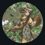 Sticker Rond Lady and Holly Berries Vintage Christmas<br><div class="desc">Une femme avec un muffet et volé et portant un casquette bedecardé avec un saint sur un arrière - plan et baies. Carte postale vintage de Noël de Samuel Lorne Schmucker de 1910.</div>