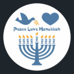 Sticker Rond L'amour pour la paix Hanoukka<br><div class="desc">Festival of Lights Hanoukka design qui dit PEACE LOVE HANOUKKA avec une branche de colombe et d'olivier,  coeur et menorah éclairé. PinkInkArt original !</div>